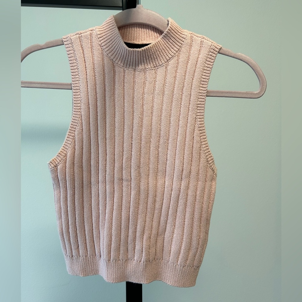 Pink sleeveless knit mock neck top